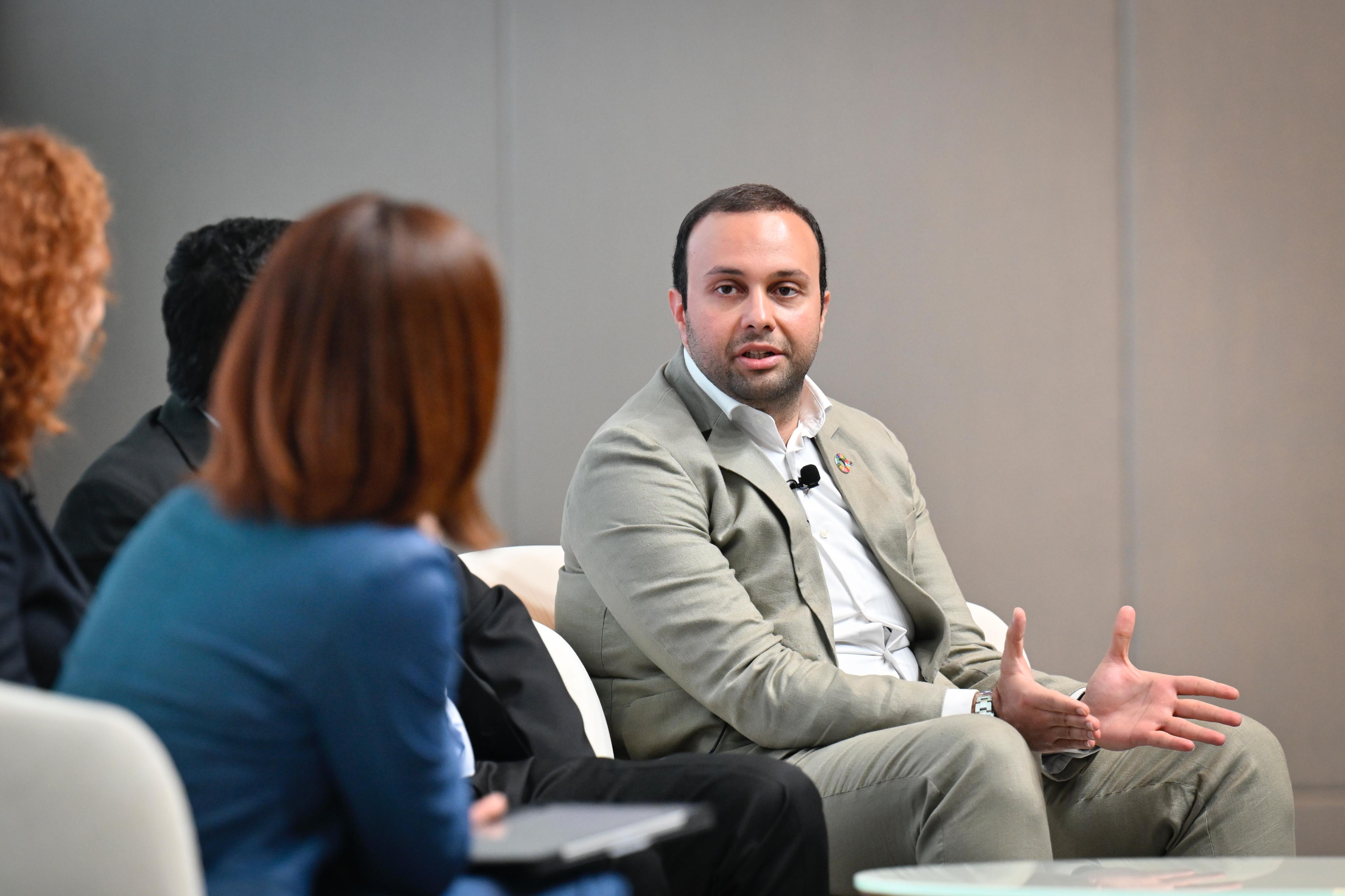 Sustainable Impact speaking on a panel
